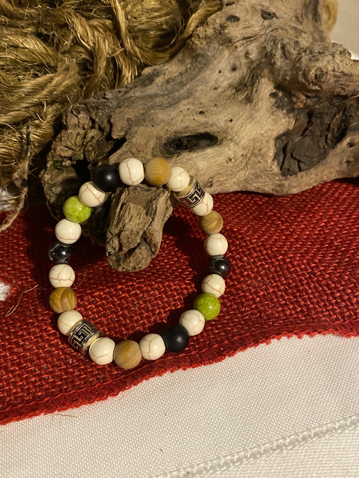Howlite, wood Jasper, shungite, hematite, green crackle